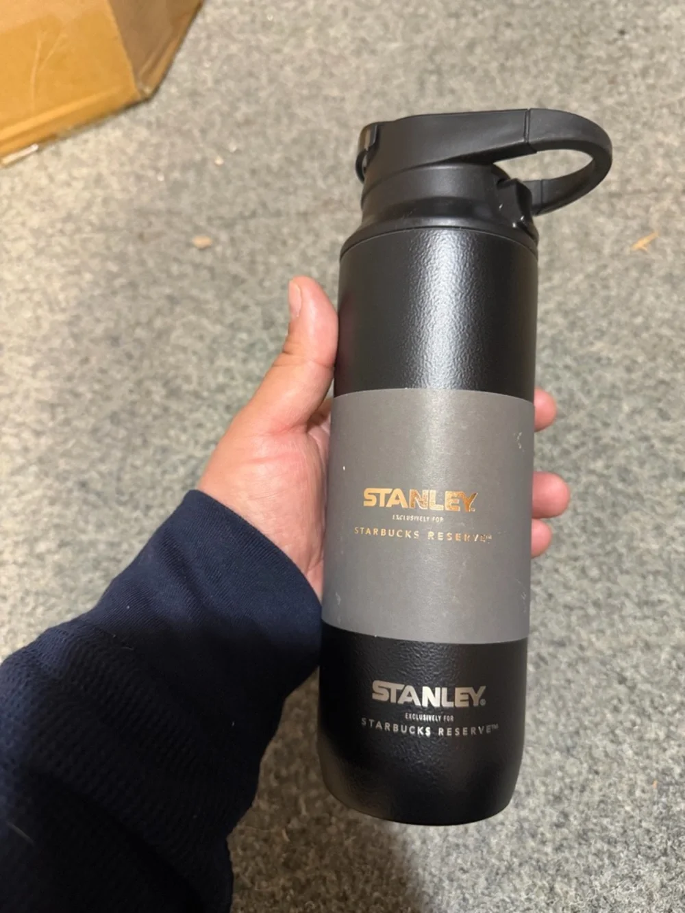 Stanley Black Travel Bottle with Gray Band and Gold Logo - Picture 1 of 4
